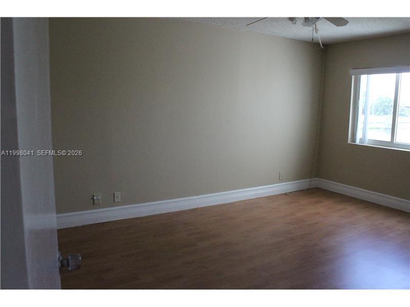 BUILDING TWO OF RACQUET C - Residential Lease