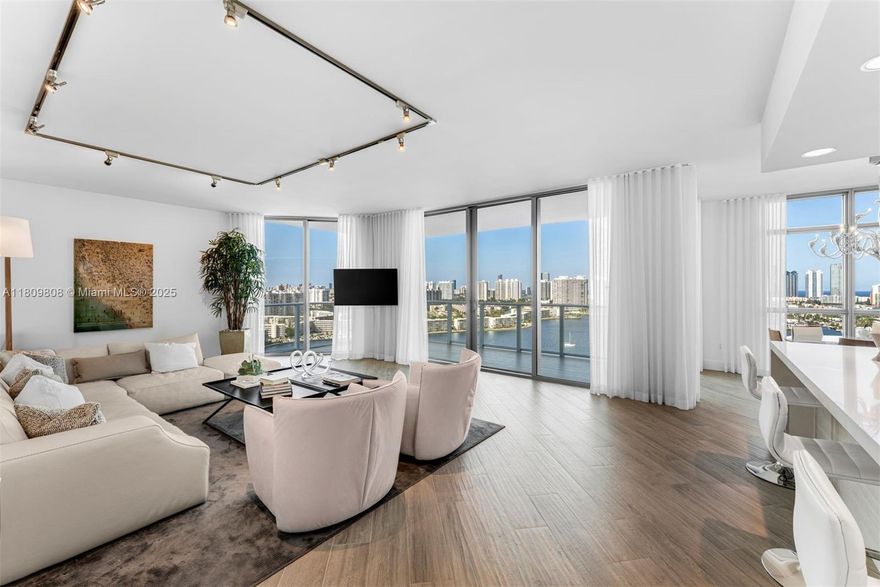 Designer-furnished corner residence with two assigned parking spaces and a private storage unit now available. This turnkey 3-bedroom home offers unobstructed water views framed by the stunning backdrop of the Sunny Isles skyline and Atlantic Ocean. Rarely used and impeccably maintained, the apartment is fully outfitted with tasteful, high-end finishes—just bring your toothbrush. Enjoy resort-style living at Marina Palms, featuring some of the most serene amenities in the area, including a waterfront fitness center, bayfront pool, kids' playroom, party lounge, and more. An ideal home for boating enthusiasts, with exclusive access to Marina Palms' private marina just steps from your door. Priced to sell.