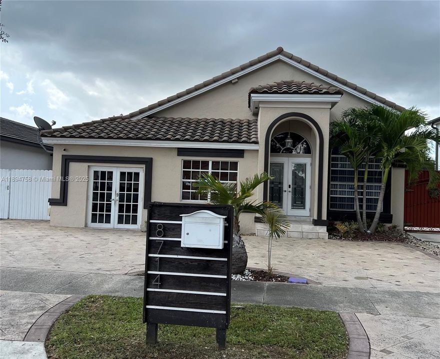 Beautifully renovated, new floors, kitchen and lighting. Plenty of space for a big family or entertaining. Two car garage originally converted to a very spacious and modern one bedroom one bath with independent entrance, perfect for an office or in-law quarters. Great location in West Miami Lakes with easy access to I-75 and 826 expressways. Expansive community parks, A+ Schools and fine dinning and entertainment makes this your perfect home!
