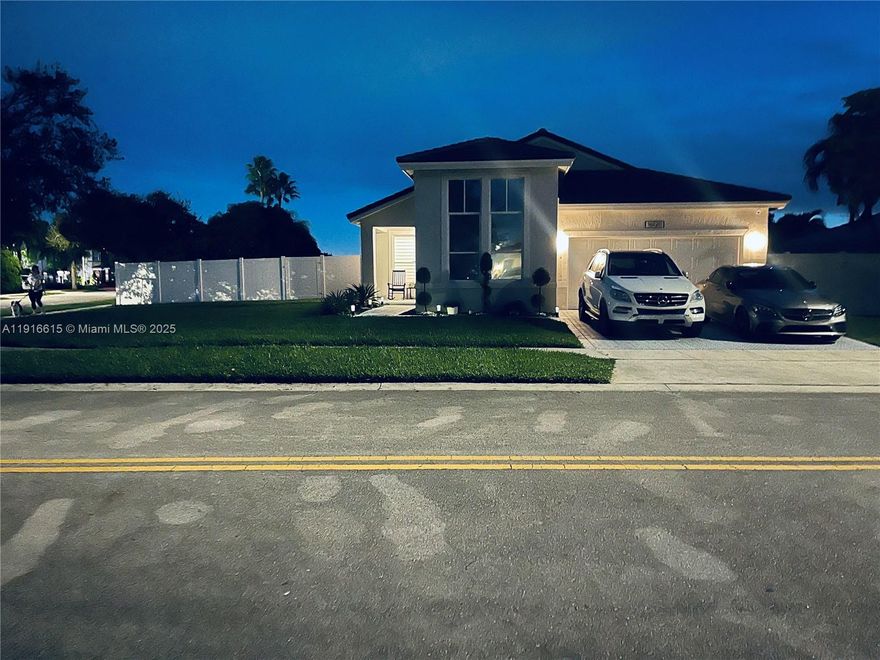 Resort-Style, Stunning Corner Lot - Spectacular Lake views from the moment you walk in and from Main bedroom, Family room & kitchen area. This fully remodeled 3-bedroom, 2-bathroom home with a 2-car garage combines modern luxury with serene lakeside living.  Every inch of this spacious residence has been thoughtfully transformed with beautiful finishes: sleek quartz kitchen countertops with waterfall design, custom cabinetry, designer lighting, and spa-like bathrooms. Open concept living areas flow effortlessly, flooded with natural light and breathtaking pool and lake views. Expansive  patio and lush landscape with mature Mango trees. New Roof 2024, Water heater 2024, Kitchen, appliances and cabinets recently remodeled. Impeccably maintained. Lot size 0.32 acre. Gated secured community.