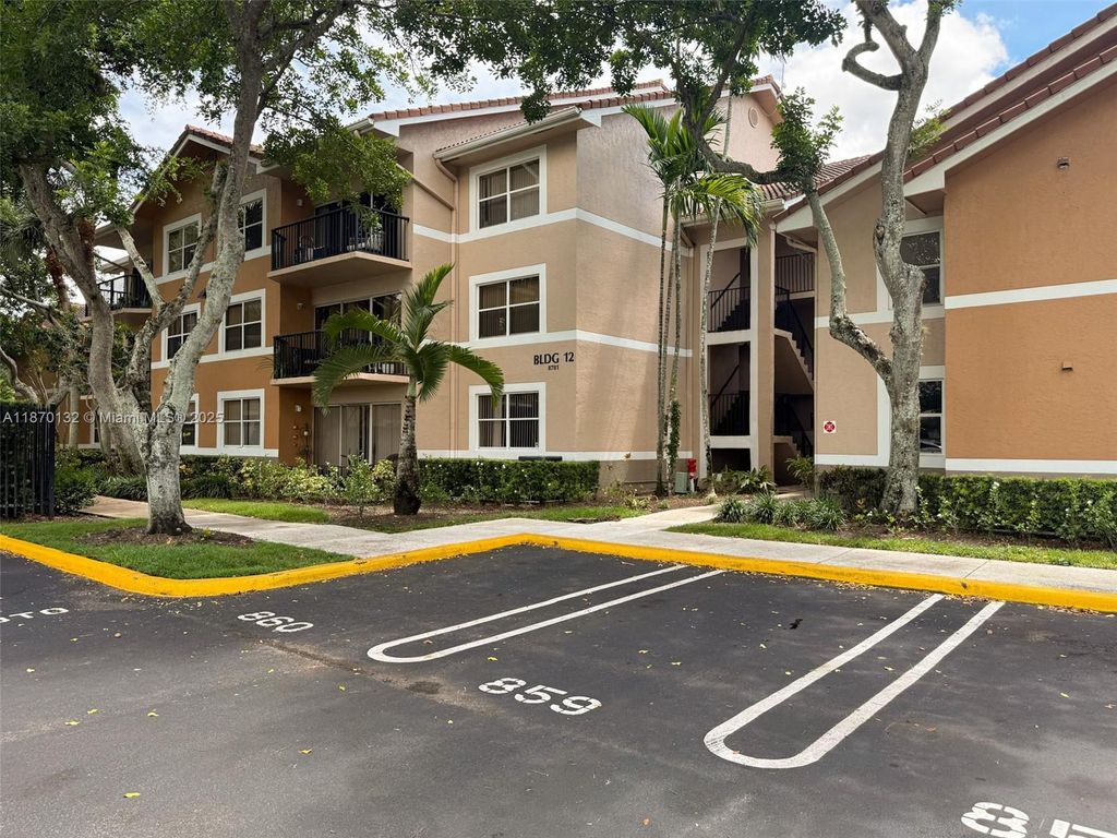 Photo of 8781 Wiles Rd #108, Coral Springs, FL 33067 (MLS # A11870132)