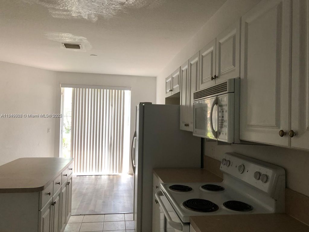 Photo of 1911 Hibiscus Ln, Riviera Beach, FL 33404 (MLS # A11849928)