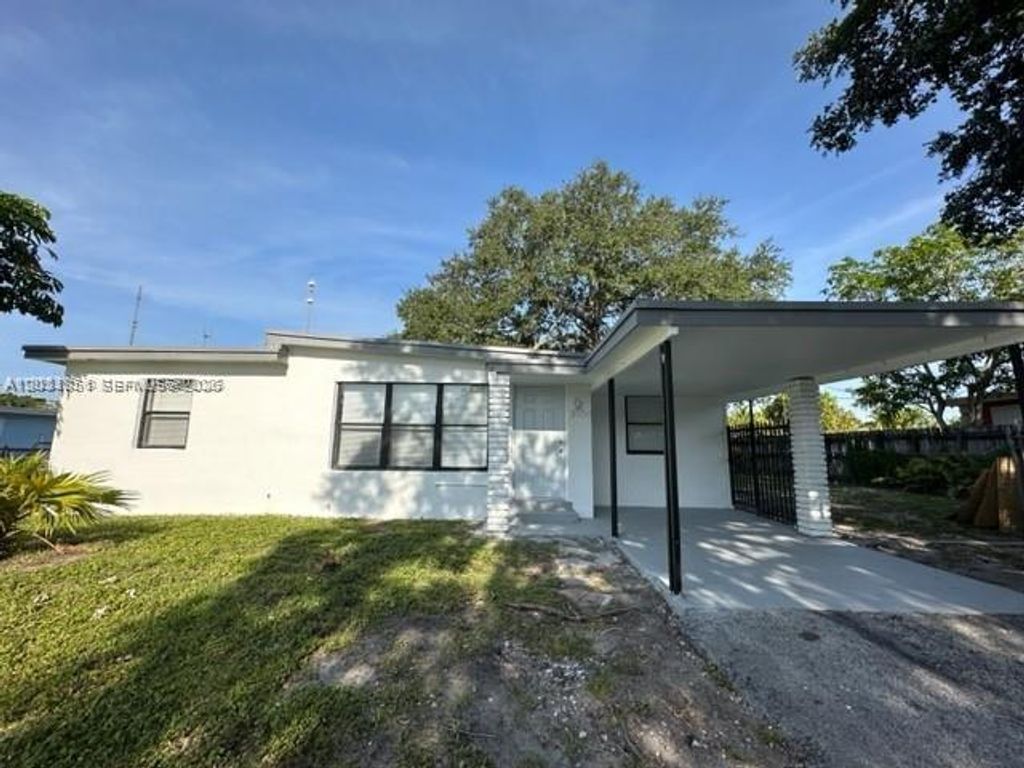 Photo of 3904 SW 58th Ave, West Park, FL 33023 (MLS # A12031851)