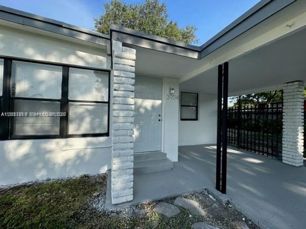 Photo of 3904 SW 58th Ave, West Park, FL 33023 (MLS # A12031851)