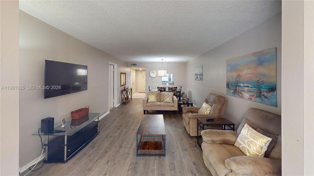 Photo of 9800 Sunrise Lakes Blvd #208, Sunrise, FL 33322 (MLS # A11991035)