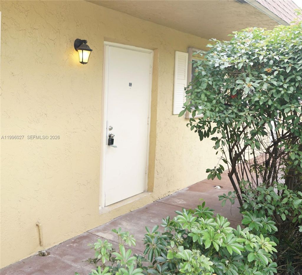 Photo of 10722 La Placida Dr #9-B2, Coral Springs, FL 33065 (MLS # A11996027)