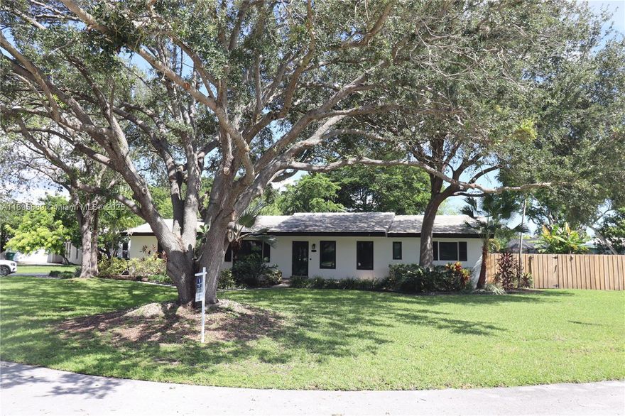 PRISTINE UPDATED PALMETTO BAY 4 BEDROOM 2-BATH POOL HOME BLENDS MODERN ELEGANCE WITH TROPICAL CHARM AND RESTS ON A LUSHLY LANDSCAPED .39 ACRE OVERSIZED LOT. THIS SPACIOUS PROPERTY OFFERS EVERYTHING FROM A SLEEK NEW KITCHEN FEATURING CALCUTTA QUARTZ COUNTERTOPS, STAINLESS STEEL APPLIANCES AND CONTEMPORARY CABINETRY THAT FLOWS SEAMLESSLY INTO A LARGE FAMILY ROOM. THERES ALSO A SPLIT BEDROOM FLOOR PLAN AND CERAMIC TILE FLOORS THROUGHOUT. BOTH BATHROOMS HAVE BEEN TASTEFULLY RENOVATED WITH MODERN FINISHES AND THE HOME IS EQUIPPED WITH IMPACT-RESISTANT DOORS AND WINDOWS. OUTSIDE, ENJOY THE OPEN SPARKLING CUSTOM POOL, A COVERED TERRACE PERFECT FOR ENTERTAINING AND A GENEROUS BACKYARD WITH ROOM FOR A RECREATIONAL VEHICLES. SUPERB LOCATION NEAR US1, THE FALLS, RESTAURANTS AND TOP-RATED SCHOOLS.