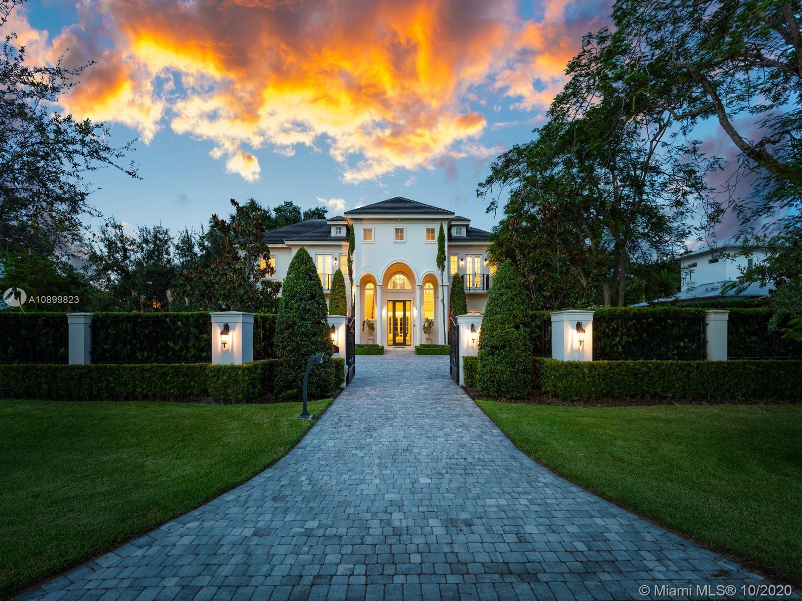 Welcome to "Chateau Marseille" a stunning french inspired estate w/exceptional architecture & remarkable design located in N Pinecrest. This captivating estate is nestled on a builders acre lot, surrounded by pristine & lush landscaping, spanning 7 BR & 8/2BA, office & theatre/media room. Greeted by volume ceilings in glorious grand foyer, leading to an expansive formal living rm w/ gorgeous views of the backyd oasis. Discover a custom chef’s kit w/ top of the line appl, walk in pantry, 1100-bottle wine cellar, & spacious family rm. Outdr living comes to life w/ covered terr, custom designed summer kit w/Subzero appl & Viking Gas Grill, heated custom-designed pool w/ swim-up bar & spa. Extra Feat: Master in both levels, 3-car gar + motor c, 2 fireplaces, elevator & Smart Home sys.