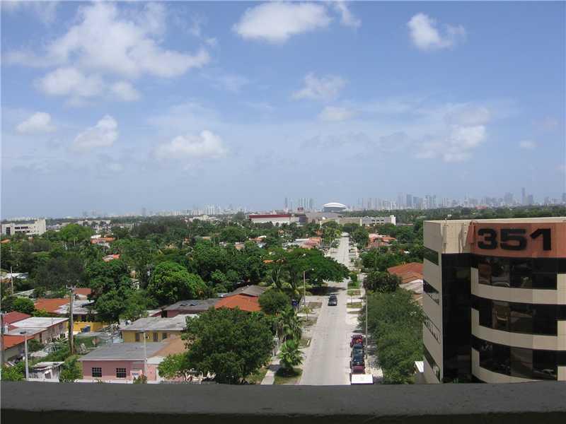 LOCATION-LOCATION-LOCATION SPECTACULAR VIEW OF THE CITY OF MIAMI FROM YOUR BALONEY-2 BEDROOM-1.5 BATH TOWNHOUSE WITH PLENTY OF CLOSET SPACE-WASHER AND DRYER INSIDE THE UNIT AND IS TOTALLY TILE THROUGH OUT THE UNIT-2 PARKING SPACES ONE IS A COVERED SPACE-G REAT BUILDING. "JUST CHECK THE PICTURES "-THIS IS ONE UNIT THAT YOU CAN'T MISS-ALL YOU NEED IS TO BRING YOUR TOOTHBRUSH. GOOD INVESTMEN OPPORTUNITY BUILDING HAS GOOD RESERVES-EASY TO SHOW. CALL LISTING AGENT