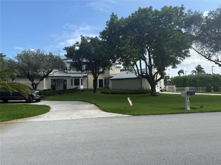 A rare rental opportunity in the prestigious "The Shire" subdivision. This completely remodeled, single-family residence sits on an 0.84-acre lot. Key features include a private pool and a versatile sports court, striped for both tennis and pickleball. The interior, with 4,768 square feet of luxury living space, features high-efficiency impact windows (Low-E) and a durable metal roof. The property includes a two-car garage. Its prime location, a short distance from the renowned American Heritage School, and its easy access to Plantation's parks make it a premier rental property, ideal for clients seeking both luxury and an active lifestyle.