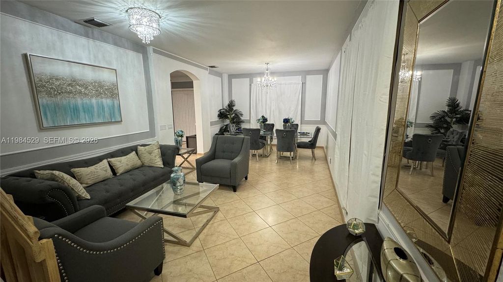 Photo of 4837 NW 20th Pl, Coconut Creek, FL 33063 (MLS # A11984529)