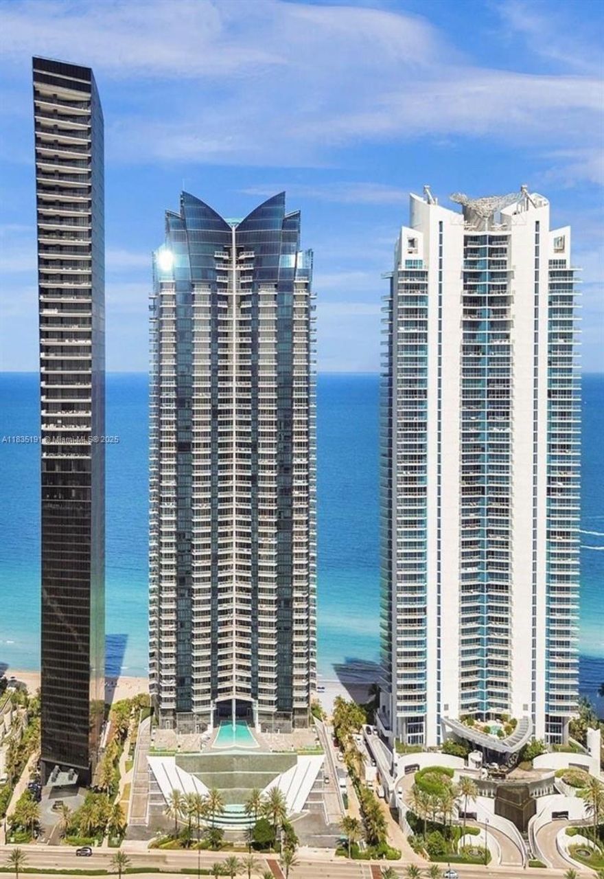 This luxury apartment in Sunny Isles Beach is a true gem, designed by the renowned Fanny Haim and featuring over $1 million in upgrades,Luxury Apartment Features:

Luxury Automation: Fully automated systems for effortless control of motorized curtains and ambient sound
Upgraded Balcony: Spacious and cozy area with breathtaking ocean views, featuring new flooring
Modernized Kitchen: Seamlessly integrated with the living area, creating a stunning space for cooking and socializing
Exclusive Decor: High-end wallpaper and decor that exudes sophistication and elegance
Ocean Views: Direct ocean views from the 2 bedrooms and den, offering a tranquil and breathtaking vista
Prime Location: Located in the best part of the building, with access to exclusive amenities