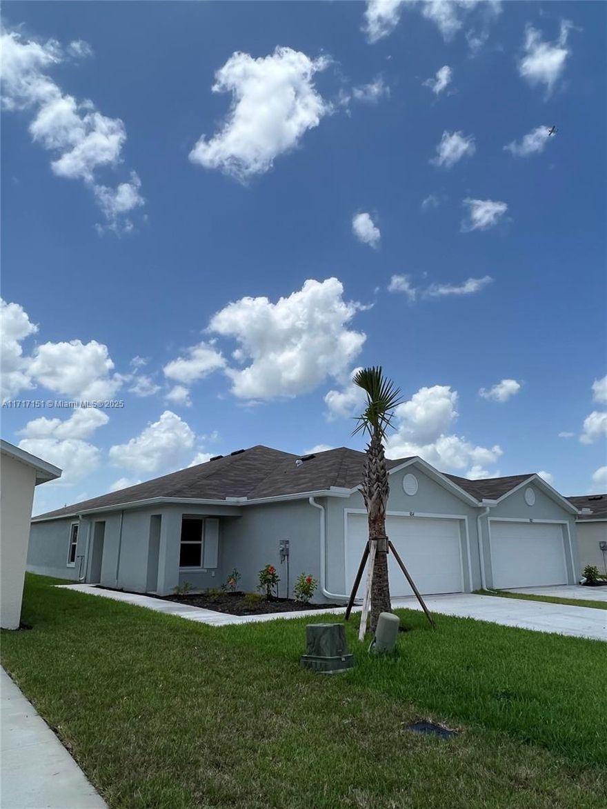 2022 year build 3 bed/2 bath Villa/half Duplex. In popular Gated community of Vistanna Villas. Total area 1808 sf, living area 1468 sf. Water view. Pets are allowed. Community has pool and playground.