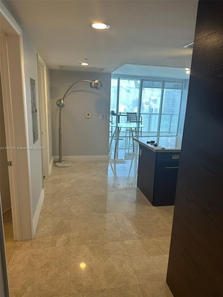 This stunning breathtaking unobstructed water and city view in the luxurious Icon Brickell. Corner unit with 2 Bedroom 2 Bath. Enjoy the view from the balcony of Biscayne Bay, Miami River and the skyline from the 52nd floor. Modern kitchen w/ Italian cabinetry, Sub-Zero/Wolf appliances and granite countertops. Marble floors throughout, floor-to-ceiling impact windows and custom closets. One assigned parking included. Icon Brickell has resort-style amenities incl. a 300-ft long swimming pool, 50-person hot tub, 5 star spa & fitness center, movie theater, game room, poolside food/beverage service, aerobic studio, steam room, sauna, 24-hr concierge & valet parking. Walk to Brickell City Centre, Mary Brickell Village, Whole Foods, restaurants, & more!