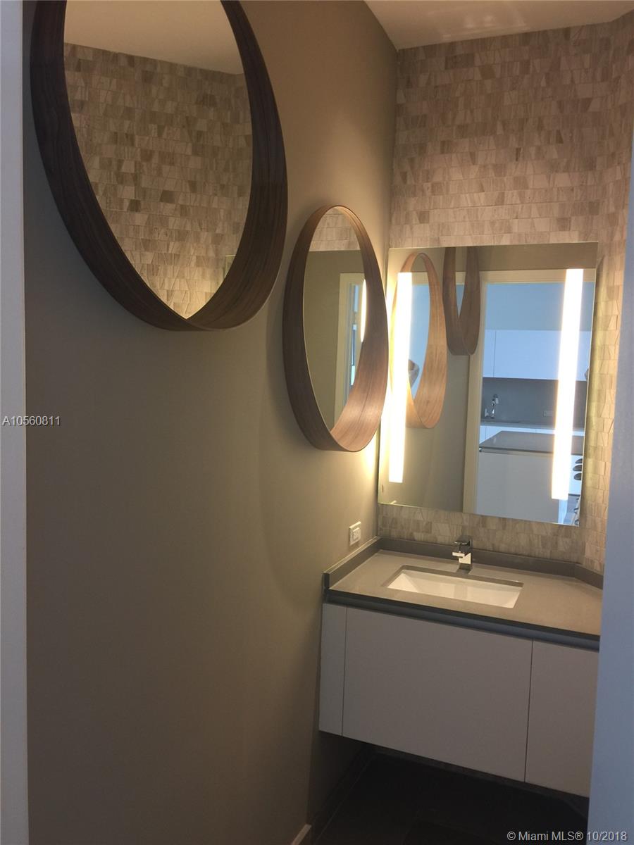 REACH CONDO - Residential Lease