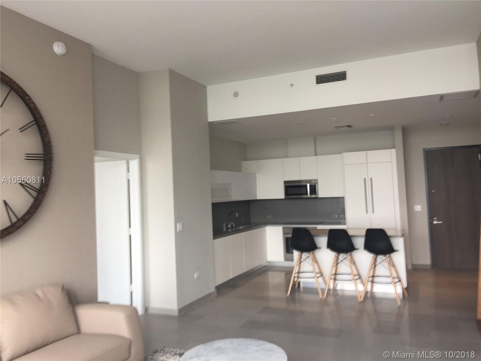 REACH CONDO - Residential Lease