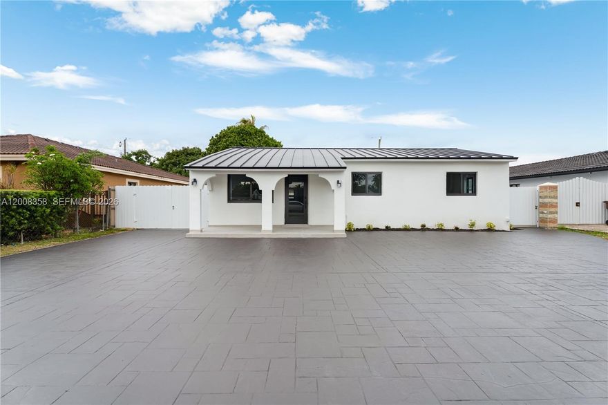 ou won’t find another home like this in Hialeah! Fully renovated with a brand-new metal roof and impact windows throughout. Showcasing elegant 24x48 Carrara-look porcelain flooring, a sleek modern kitchen with new cabinetry, quartz countertops and a stunning waterfall island, LED lighting, and beautifully updated bathrooms.

The spacious primary bedroom features not one, not two, but three oversized closets—a rare and highly desirable find. Step outside to a brand-new tiled patio with matte 24x48 finishes, perfect for entertaining. The expansive backyard offers ample space to create your dream pool and outdoor oasis.

Appliances will be installed prior to closing.
This is the one you’ve been waiting for—don’t miss it!