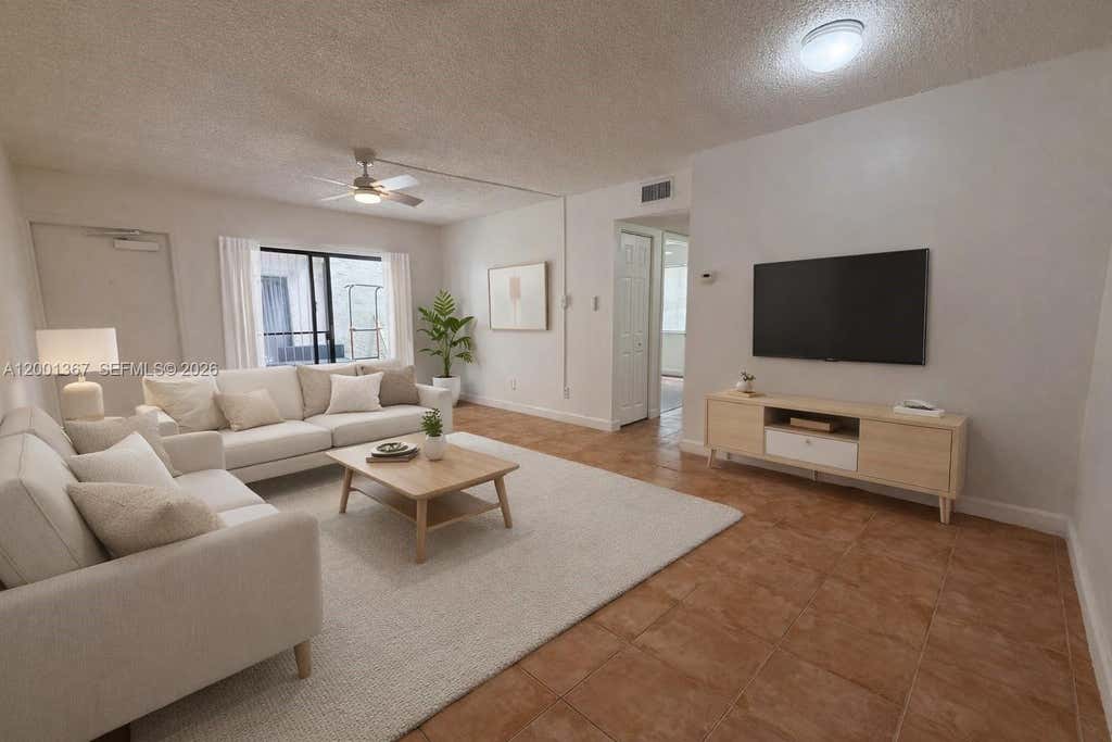 Photo of 11120 Royal Palm Blvd #4-10, Coral Springs, FL 33065 (MLS # A12001367)