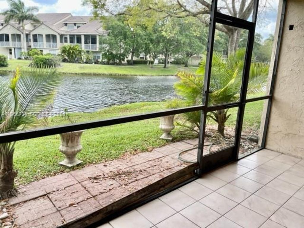 Photo of 613 N University Dr #4, Plantation, FL 33324 (MLS # A11966738)