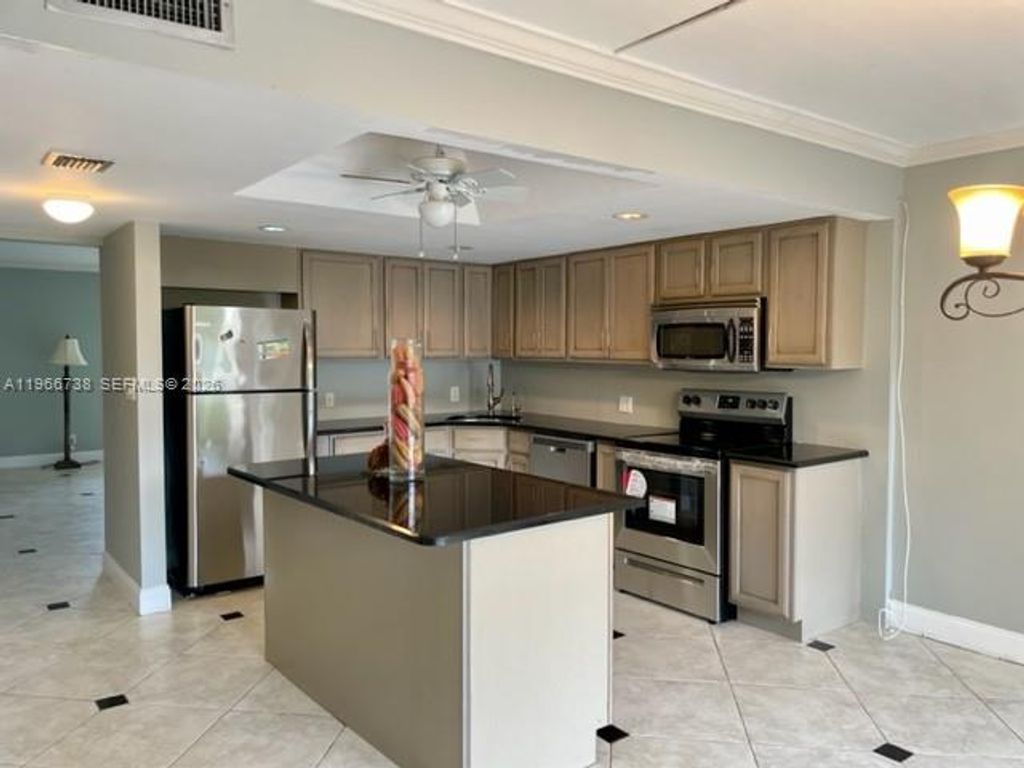Photo of 613 N University Dr #4, Plantation, FL 33324 (MLS # A11966738)