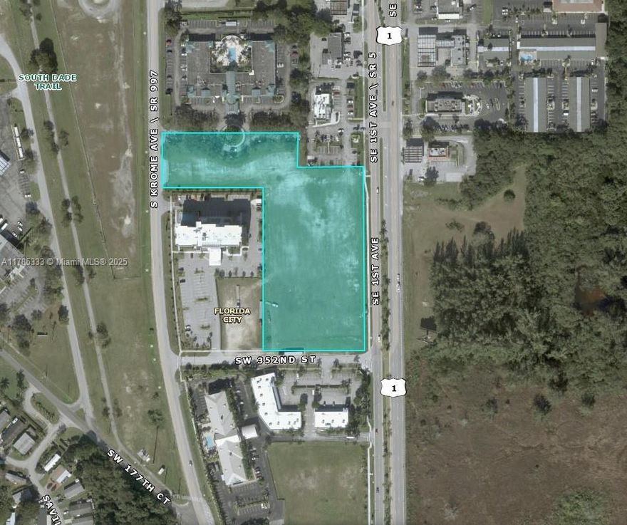 Rare opportunity to own 4.98 acres of vacant industrial-zoned land with high visibility frontage on both US-1 and Krome Avenue. Surrounded by major hotel chains, restaurants, and gas stations, this parcel sits in the heart of rapidly growing Florida City- just before iconic stretch into the Florida Keys. This is one of the last vacant parcels offering unparalleled development potential for logistics, warehousing, hospitality, or mixed use commercial projects. With high traffic counts and easy access to major highways, this location is ideal for investors and developers seeking prime real estate in growth corridor. Located in between the Best Western and Fairfield Inn by Marriott, next to the Pollo Tropical, and across the street from McDonald's and Exxon Gas Station.