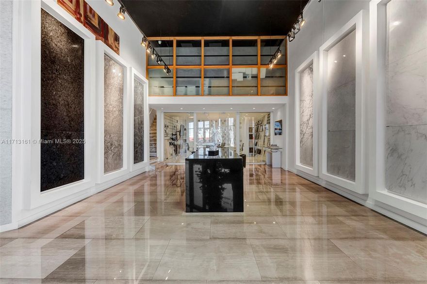 This property offers a unique combination of offices, workstations, showroom, and warehouse all within an 8,697 square foot lot. The building itself spans 10,287 square feet and features three bathrooms, two air conditioning units, a conference room, two workstations above the conference room, and one office downstairs. Upstairs, you will find 11 workstations and five private offices. Additionally, there is a bay door that measures 14 feet high by 13 feet wide. This versatile space is ideal for a variety of businesses looking for a professional and functional work environment.