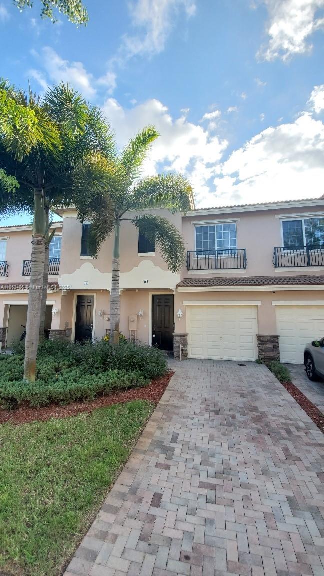 "A" rated Weston school district. 1,980 square feet completely remodeled with new paint, ceramic tile on ground floor and laminate on the second floor. Open kitchen with granite counter tops, cherry wood cabinets and new stainless steel appliances. The upstairs has a spacious master bedroom with an oversized walk-in closet and large bath. The other side has the second and third bedrooms with full bath & a loft area. A full size laundry room and separate walk-in storage room on ground floor. Private patio with no neighbors behind give this home privacy. Family oriented community with pool and small park. Easy access to I-75/595 highways. Agent is owner
