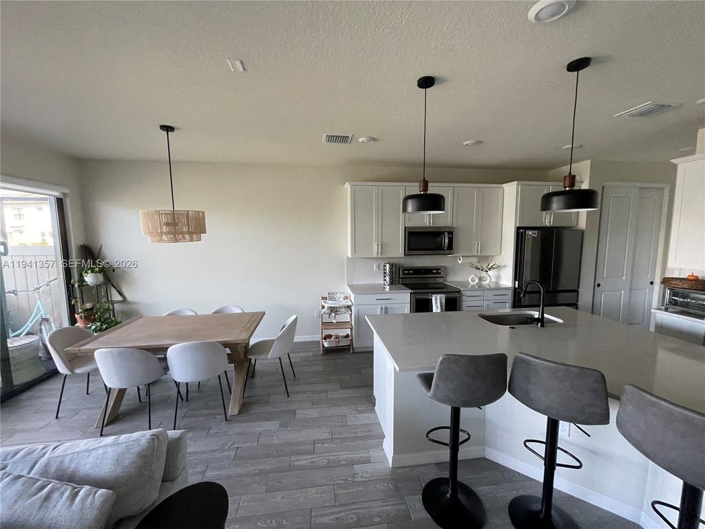 Photo of 4441 E Appleton Cir E, Oakland Park, FL 33309 (MLS # A11941357)