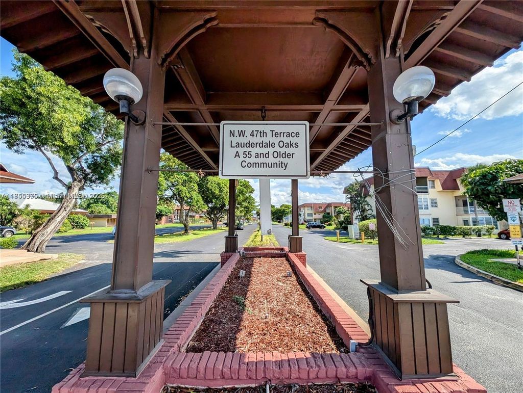 Photo of 3081 NW 47th Ter #112, Lauderdale Lakes, FL 33313 (MLS # A11855375)