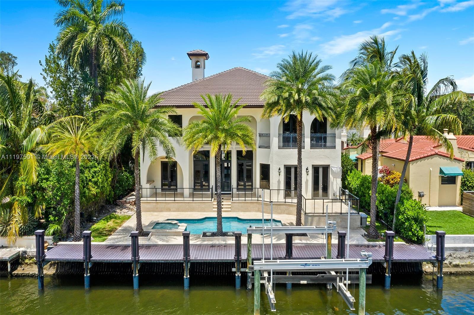 LOWEST PRICE PER SQ/FT WATERFRONT HOME IN THE PRESTIGIOUS GUARDED SEVEN ISLES COMMUNITY. THIS RENOVATED 5 BEDROOM AND 5.5 BATHROOM 2 STORY WATERFRONT HOME IS LOCATED IN THE HEART OF LAS OLAS AND HAS A 75' DOCK THAT CAN ACCOMMODATE A 55' YACHT. WITH NO FIXED BRIDGES, YOU ARE JUST A FEW MINUTES FROM THE ATLANTIC OCEAN! FEATURING AN OPEN FLOORPLAN AND HUGE KITCHEN WITH A VIKING GAS RANGE AND SUB ZERO FRIDGE. THE OUTDOOR MARBLE PATIO HAS TWO LEVELS FOR ENTERTAINING AND A 20,000 LB BOAT LIFT. THE RECENTLY INSTALLED DOCK IS MADE FROM WEATHERPROOF TREX COMPOSITE DECKING MATERIAL. 3 CAR GARAGE WITH A HYDRAULIC LIFT ALLOWS YOU TO STORE UP TO 4 CARS. AMAZING POOL AND HOT TUB. IMPACT WINDOWS AND DOORS AND A BRAND NEW ROOF WAS JUST INSTALLED IN 2021! COME SEE THIS GORGEOUS RESIDENCE TODAY!