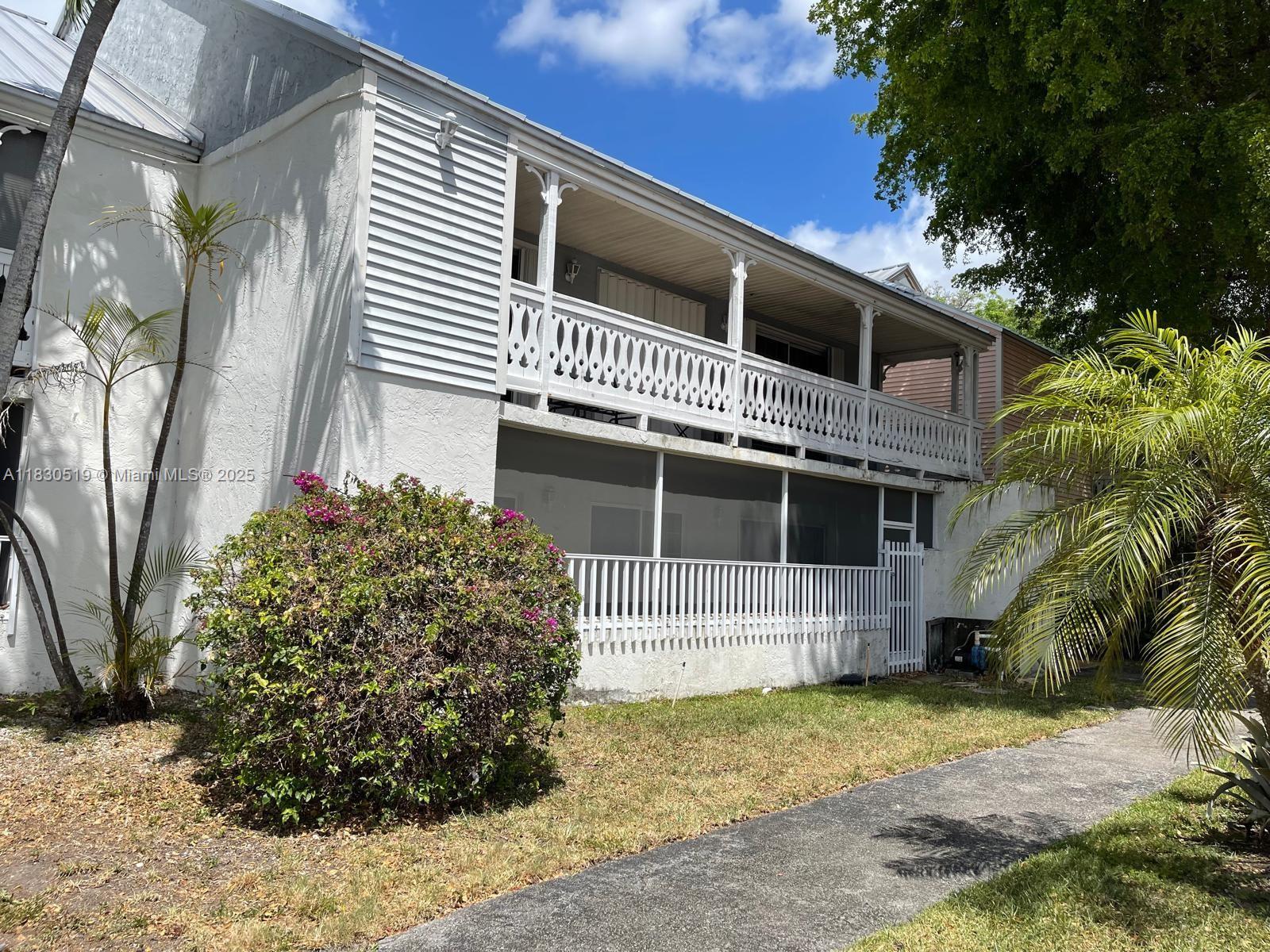 Ready to move in and EASY TO SHOW!! freshly painted 2nd floor unit with LARGE balcony. Lovely 2 BED 2 BATH IN MAHOGANY KEY, RIGHT IN FRONT OF WIDE OPEN LAKE!. Tiled throughout, washer and dryer inside unit inside gated community. ENJOY ALL THE HAMMOCKS AMENITIES: CLUBHOUSE, POOL, EXERCISE TRAILS, TENNIS COURTS, AND 14 MILES OF WALK AROUND LAKE, 22 PRIVATE LAKE, BEACH AND BIKING PATH. Centrally located within walking distance to the bus stop, shopping center and restaurants.