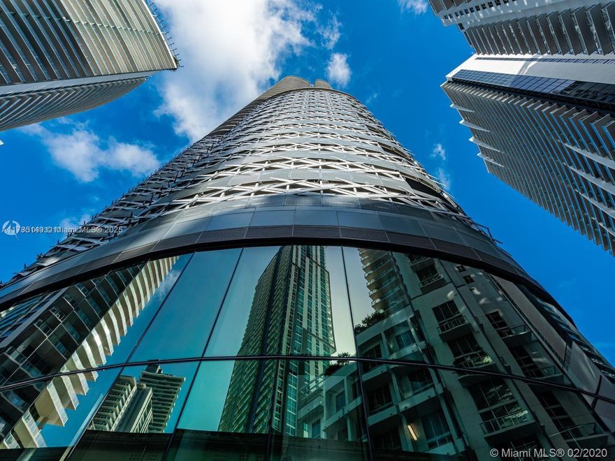 Live at the newest & most luxurious building with the highest quality and in the best location in Downtown Brickell. This 2 bedrooms and 2 baths with 1/2 bath on the 35th floor at the brand new ultra-luxurious Brickell Flatiron Condo. This unit is the 01 line; the most coveted line in the tower. With 9' ceilings and floor to ceiling glass, breathtaking views south, east, north, and west. The colorful city lights, Biscayne Bay, and views as far as Coconut Grove are yours to enjoy. Amenities include 2 Pools,2 Jacuzzis, State of the Art Fitness Center, Spa with Steam, Sauna and massage & spectacular views from the 64th level amenity floor.2 Lounges, Theatre room, billiard room, and Children room. New electric shades and brand new closets installed.