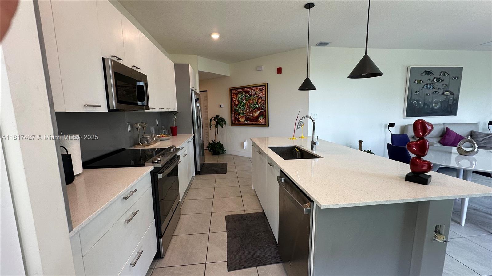 Spectacular furnished 3-bedroom, 2-bathroom corner condo, URBANA's largest model, in the heart of Doral. Modern kitchen with large island, quartz countertops, stainless steel appliances, impact-resistant windows and doors, and in-unit washer/dryer. Enjoy exclusive access to the clubhouse with a resort-style pool, water park, fitness center, basketball court, and more. Located just steps from schools, parks, Publix, and restaurants in the desirable Downtown Doral neighborhood, its prime location gives you easy access to freeways and is just minutes from Miami Airport. You'll love it!