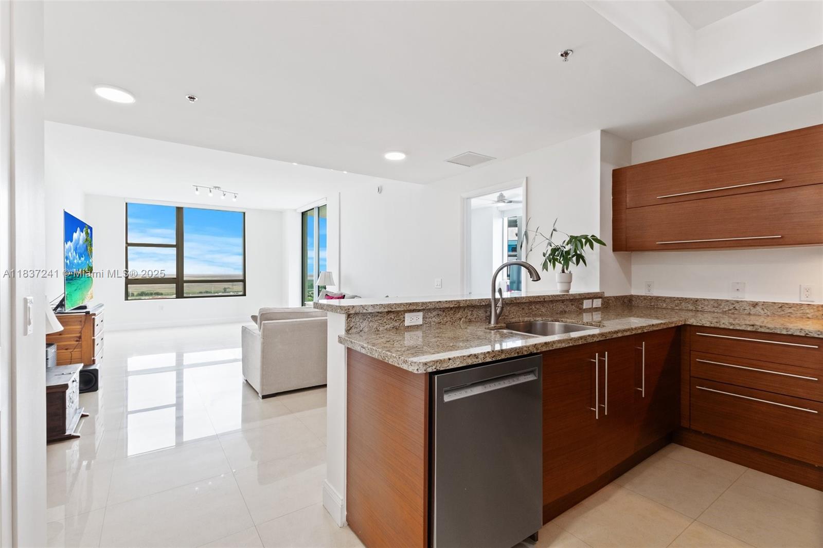 TAO SAWGRASS CONDOMINIUM - Residential