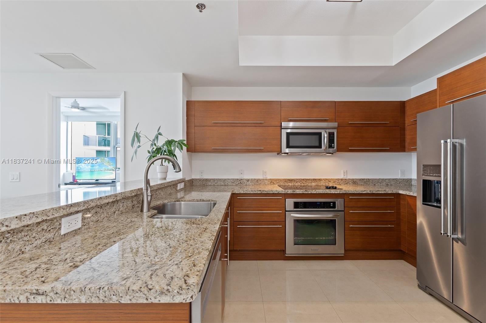 TAO SAWGRASS CONDOMINIUM - Residential