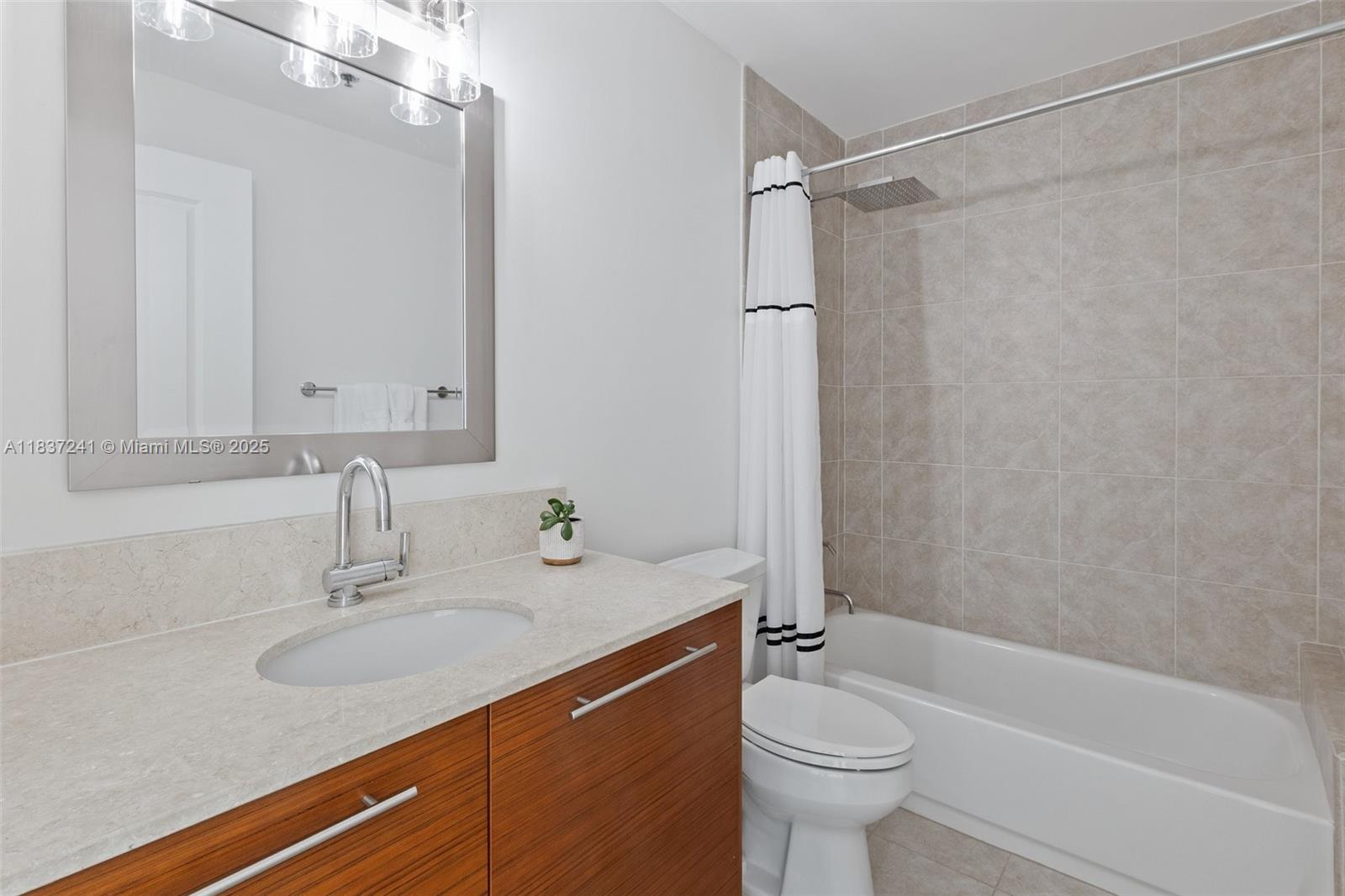 TAO SAWGRASS CONDOMINIUM - Residential