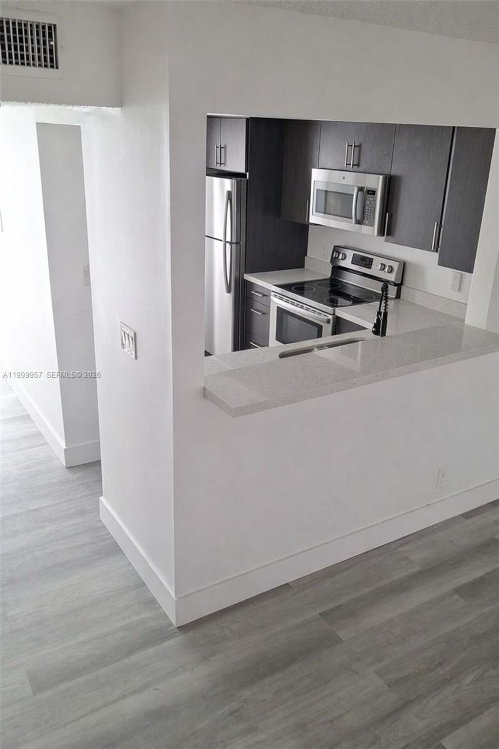 Photo of 2831 Pierce St #106, Hollywood, FL 33020 (MLS # A11999957)