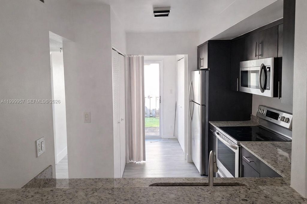 Photo of 2831 Pierce St #106, Hollywood, FL 33020 (MLS # A11999957)