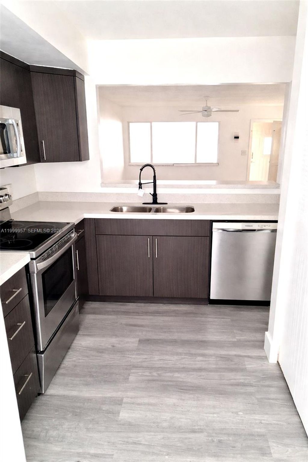 Photo of 2831 Pierce St #106, Hollywood, FL 33020 (MLS # A11999957)