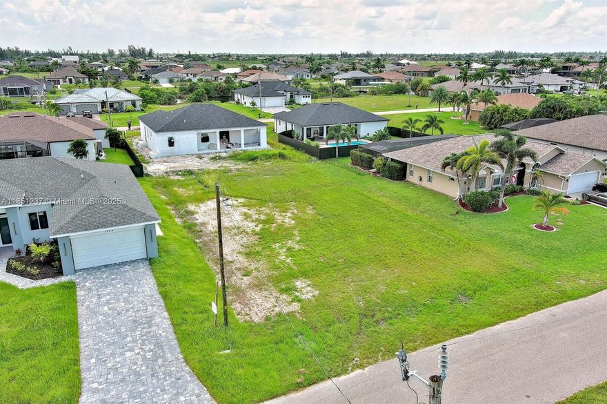 Exclusively presented by Sunland Real Estate: Build your dream home on this spacious lot in NW Cape Coral! Located in one of the most desirable and fast-growing areas of Cape Coral, this lot offers the perfect opportunity to design and build your custom home with plenty of room for a large footprint, pool, and outdoor living space. Situated in a quiet residential neighborhood surrounded by newer homes, this lot is ideal for investors, builders, or future homeowners looking for privacy, space, and flexibility.