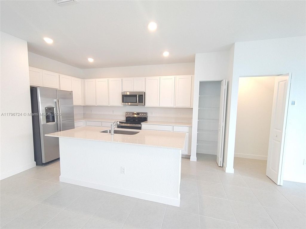 Photo of 522 SE Rivergrass St, Port St Lucie, FL 34984 (MLS # A11796724)