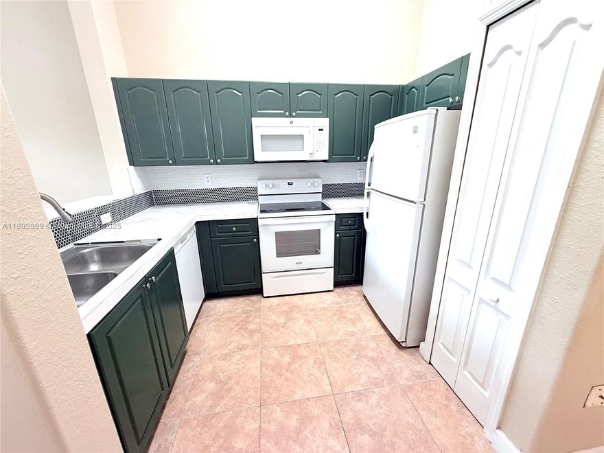 Attention investors amazing three bedroom apartment with two bathrooms. Spacious floor plan with 3 bedrooms, lots of closet space, and plenty of natural light, washer and dryer inside the unit, freshly painted, all tile floors, two parking assigned, updated kitchen, new appliances. Complex is gated with security, 2 swimming pools, beautiful lakes view, easy access to US1 and Turnpike. Easy to show!