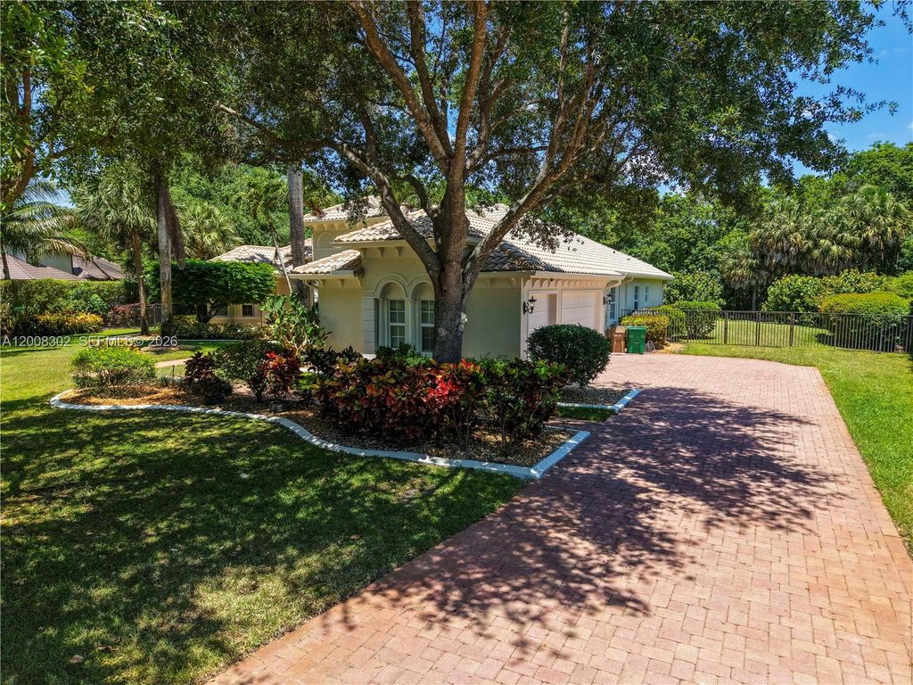 Photo of 12743 N Winners Cir, Davie, FL 33330 (MLS # A12008302)