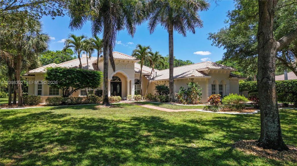 Photo of 12743 N Winners Cir, Davie, FL 33330 (MLS # A12008302)