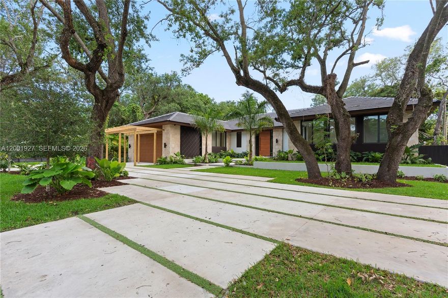 Discover a true luxury opportunity just minutes from Dadeland Mall. This stunning 5-bedroom, 6.5-bath residence offers 4,618 sq ft of refined living space on an expansive 23,037 sq ft lot. Designed with elegance and functionality in mind, the home features a European-style kitchen with natural stone finishes and top-of-the-line Sub-Zero & Wolf appliances. Enjoy porcelain flooring throughout, LED lighting, and high-end finishes in every detail. The outdoor space is perfect for entertaining, complete with a pool and spacious terrace. Equipped with dual Goodman A/C systems and built for modern living, this home delivers the perfect blend of luxury, comfort, and prime location.