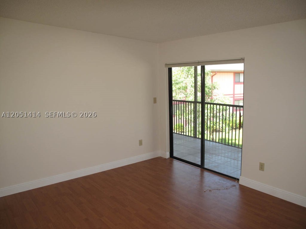 Photo of 9632 S Belfort Cir #204, Tamarac, FL 33321 (MLS # A12051414)