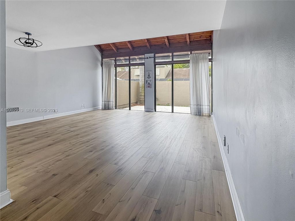 Photo of 1180 Windward Dr, Pembroke Pines, FL 33026 (MLS # A12002913)