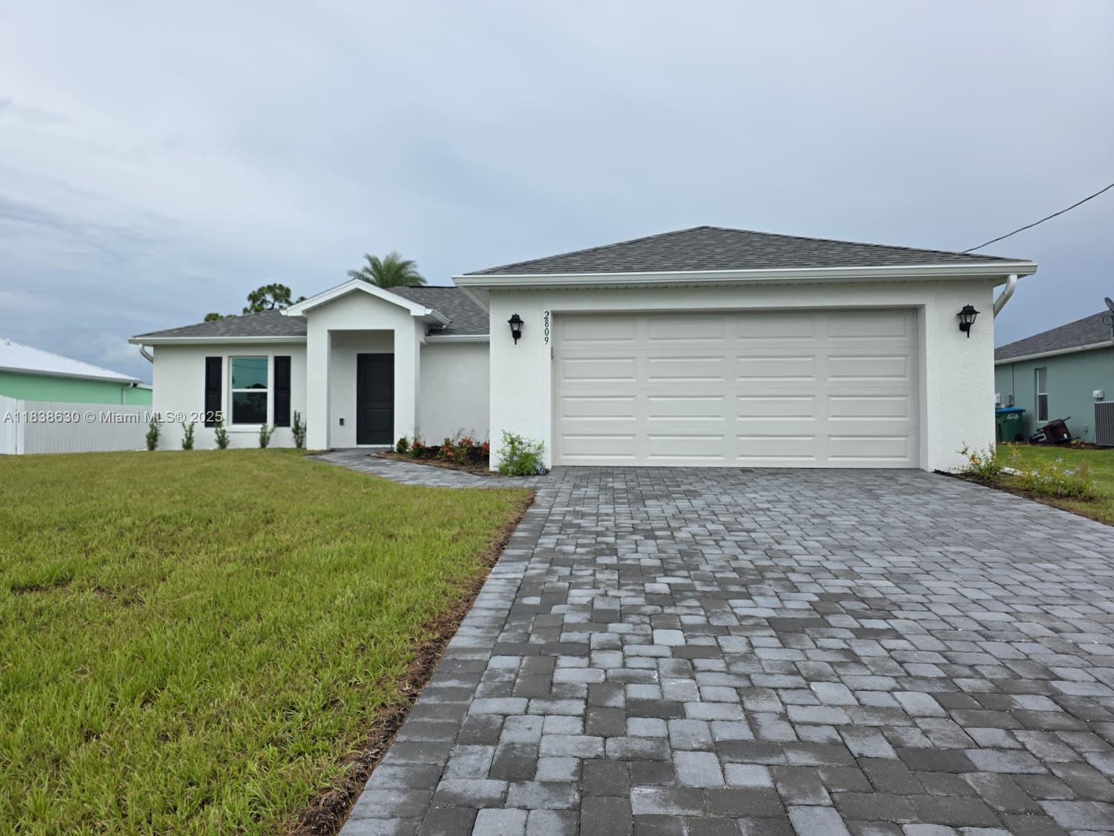 This 3BR/2BA home blends sleek design with everyday comfort—featuring a modern open floor plan, durable tile flooring, granite countertops, and a stainless-steel kitchen built to impress. The spacious primary suite includes a walk-in closet and private bath. Additional perks include a walk-in pantry, impact-rated windows, and a covered lanai overlooking a large backyard. Minutes from local parks, shopping, and commuter routes.