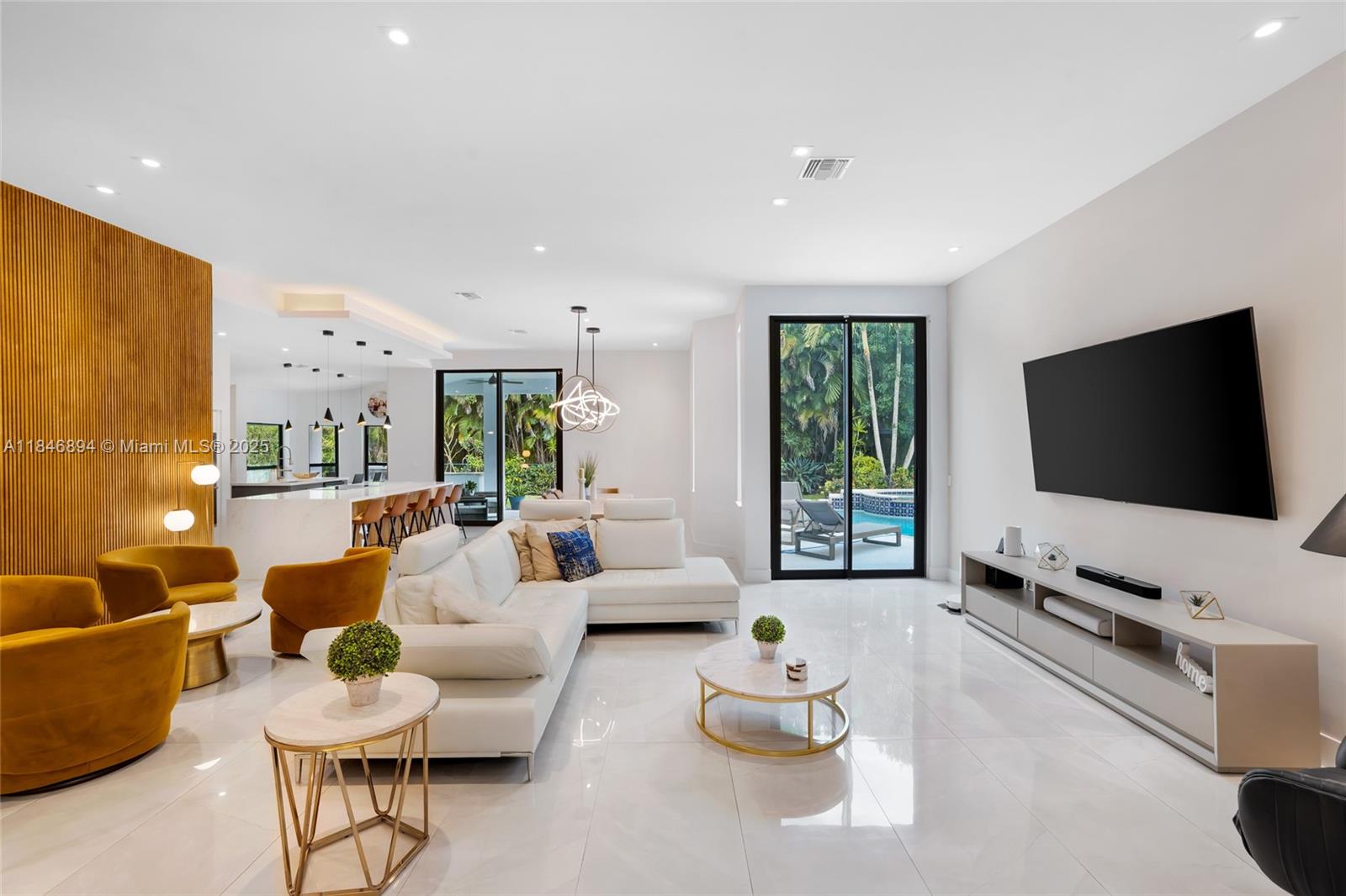 Magazine-Worthy 4-Bed Designer Pool Home in Prestigious Meadow Run – This fully remodeled, designer-renovated residence in Parkland blends luxury and functionality in every detail. Featuring a custom kitchen with dual islands, top-tier appliances, soft-close cabinetry, and a spacious butler’s pantry, it’s perfect for hosting and entertaining. The expansive primary suite offers dual California closets and a spa-like bath with Italian stone, jacuzzi tub, and sleek walk-in shower. Enjoy smart lighting, soaring ceilings, impact windows/doors, and an open, light-filled layout. Outdoor oasis with pool, spa, summer kitchen, cabana bath, fenced yard, and 3-car garage with plenty of driveway space. Gated community with tennis & basketball and top-rated Parkland schools.