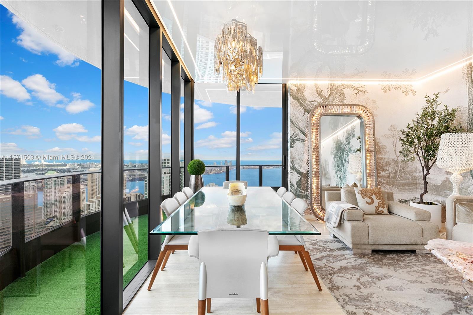Welcome to Ugo Colombo’s CMC Group luxury condo development, the Brickell Flatiron; a 64-story glass tower featuring the highest quality Italian finishes, unparalleled services, resort style amenities & expansive residences. This NE corner 60th floor penthouse unit comes fully furnished with Italian furniture, Miele appliances, 10ft ceilings, 518sf of terrace space split in two, 2 assigned parking spaces + 1 Valet space and 270-degree views. Located in the heart of Brickell, residents are ideally situated within proximity of Mary Brickell Village and Brickell City Centre—offering unparalleled access to a wide array of world-class restaurants, shops, international airports, and Miami's Financial Center.